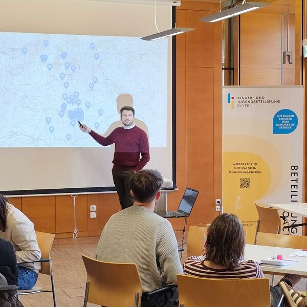Referent und Zuhörer bei der Schulung der Beteiligungscoaches